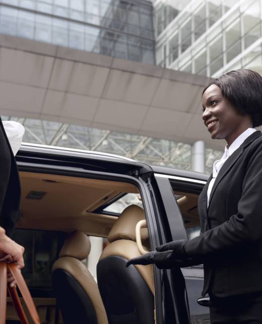 businesswoman-getting-taxi-cab